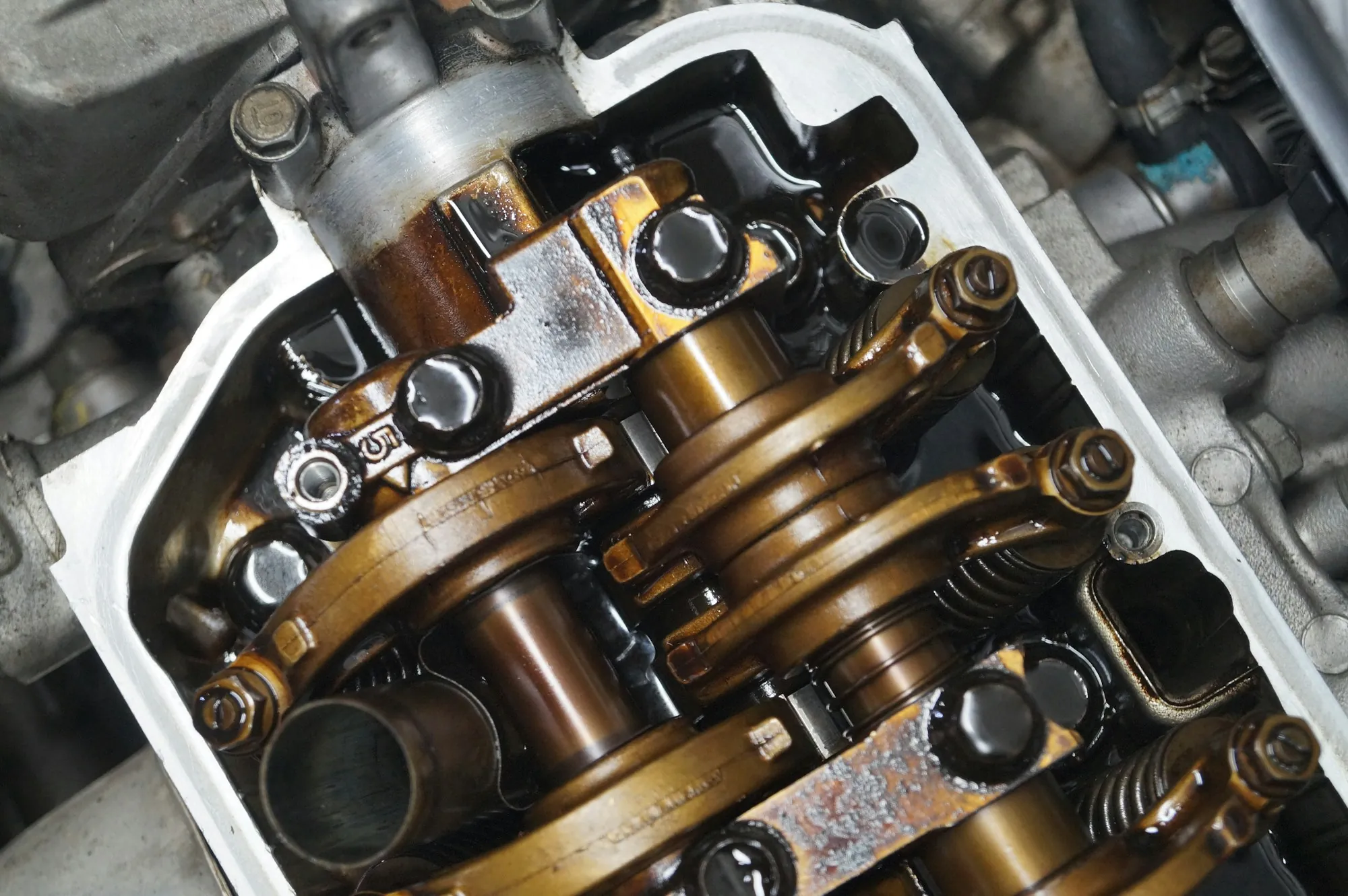 Close view of an engine's valve train and camshaft during repair